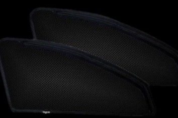 A pair of car sun shades.