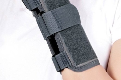 Grey elbow and forearm brace.