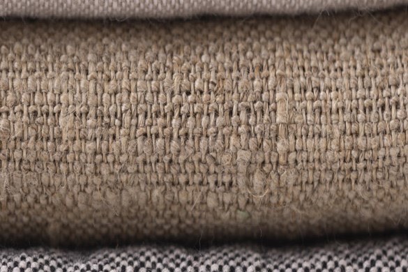 Tan burlap beside a check weave.