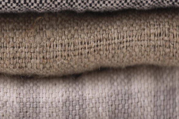 Stack of natural linen fabric.